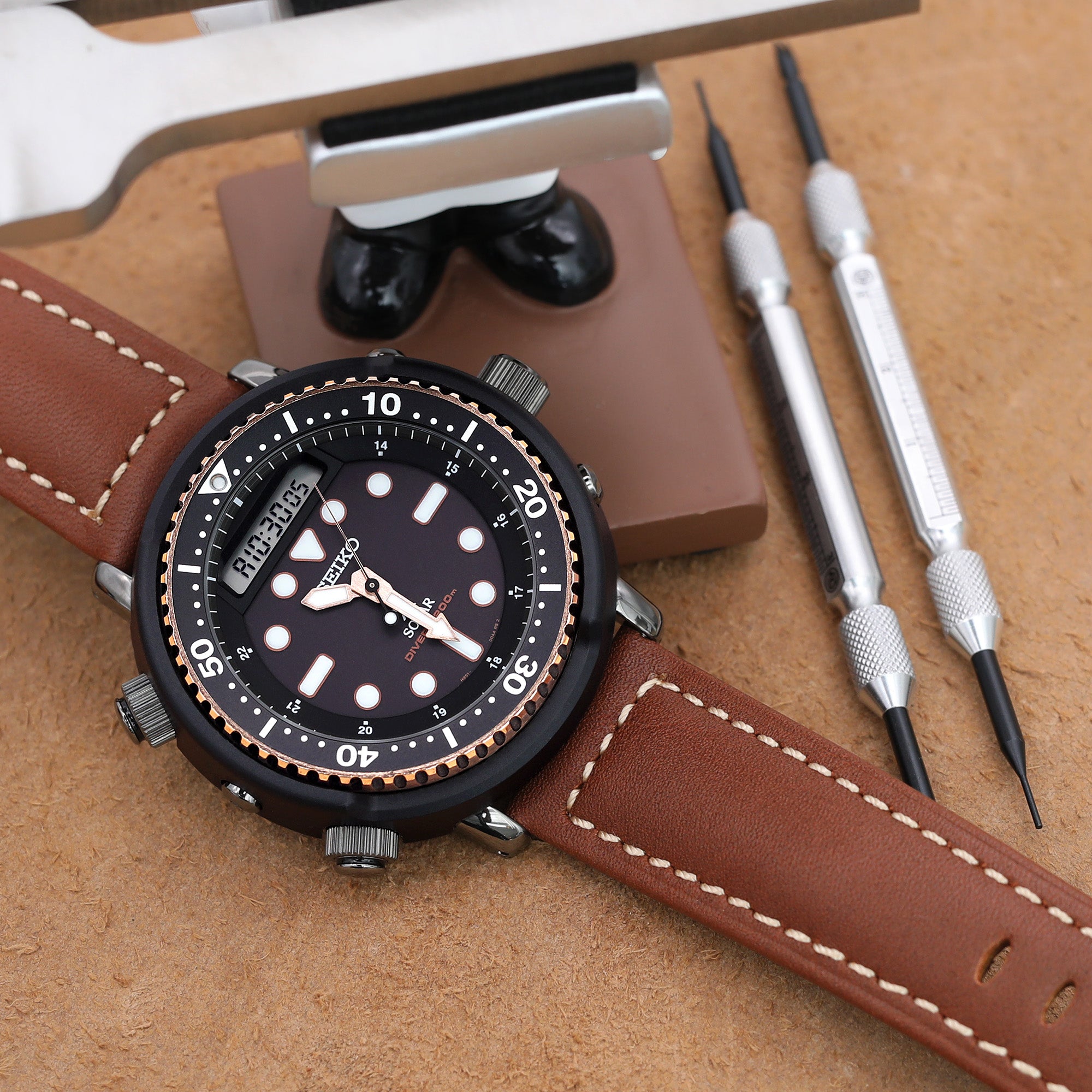 Seiko Prospex Arnie Re-Issue Solar Hybrid Black Gold LCD Watch SNJ028P1 Strapcode Watch Bands